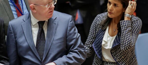 United States Ambassador to the United Nations Nikki Haley and Russian Ambassador to the United Nations Vasily Nebenzya are seen before the United Nations Security Council meeting on Syria at the U.N. headquarters in New York, U.S., April 13, 2018 - Sputnik International