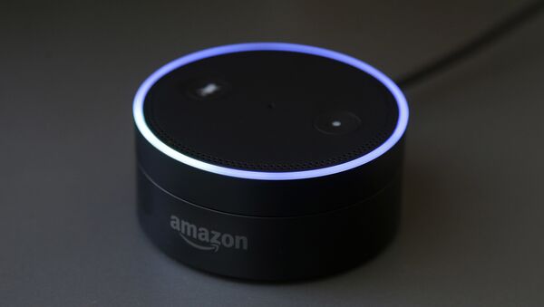 March 2, 2016 photo shows an Echo Dot in San Francisco. Amazon.com is introducing two devices, the Amazon Tap and Echo Dot, that are designed to amplify the role that its voice-controlled assistant Alexa plays in people's homes and lives - Sputnik International