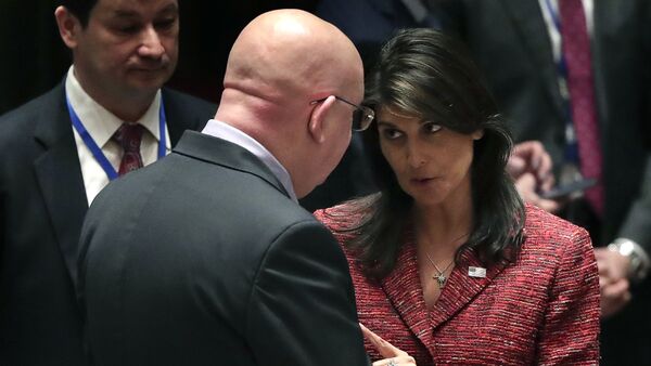 United States Ambassador to the United Nations Nikki Haley, right, talks with Russian Ambassador to the United Nations Vasily Nebenzya before a Security Council meeting, Tuesday, April 10, 2018, at United Nations headquarters - Sputnik International