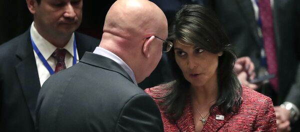 United States Ambassador to the United Nations Nikki Haley, right, talks with Russian Ambassador to the United Nations Vasily Nebenzya before a Security Council meeting, Tuesday, April 10, 2018, at United Nations headquarters United States Ambassador to the United Nations Nikki Haley, right, talks with Russian Ambassador to the United Nations Vasily Nebenzya before a Security Council meeting, Tuesday, April 10, 2018, at United Nations headquarters - Sputnik International