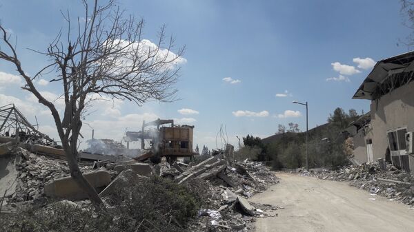 Aftermath of attack on the Barzah scientific research center near Damascus, April 14, 2018 Aftermath of attack on the Barzah scientific research center near Damascus, April 14, 2018 - Sputnik International
