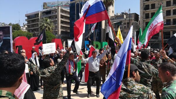 Hundreds of Syrians are demonstrating in the Syrian capital Damascus - Sputnik International