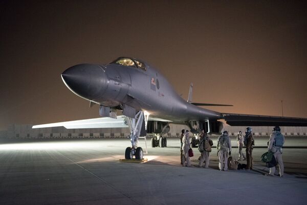 A U.S. Air Force B-1B Lancer and crew, being deployed to launch strike as part of the multinational response to Syria's use of chemical weapons, is seen in this image released from Al Udeid Air Base, Doha, Qatar on April 14, 2018 - Sputnik International