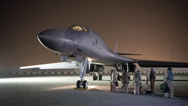 A U.S. Air Force B-1B Lancer and crew, being deployed to launch strike as part of the multinational response to Syria's use of chemical weapons, is seen in this image released from Al Udeid Air Base, Doha, Qatar on April 14, 2018 - Sputnik International