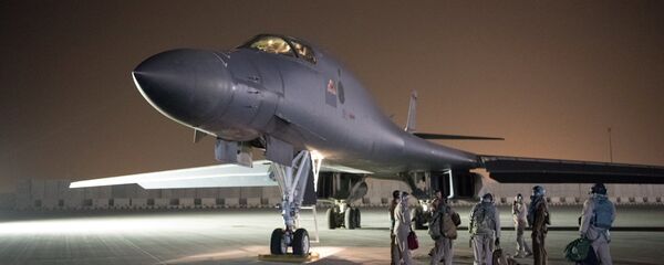 A U.S. Air Force B-1B Lancer and crew, being deployed to launch strike as part of the multinational response to Syria's use of chemical weapons, is seen in this image released from Al Udeid Air Base, Doha, Qatar on April 14, 2018 A U.S. Air Force B-1B Lancer and crew, being deployed to launch strike as part of the multinational response to Syria's use of chemical weapons, is seen in this image released from Al Udeid Air Base, Doha, Qatar on April 14, 2018 - Sputnik International