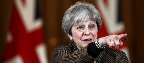 Britain's Prime Minister Theresa May attends a press conference in 10 Downing Street, London, April 14, 2018. Britain's Prime Minister Theresa May attends a press conference in 10 Downing Street, London, April 14, 2018. - Sputnik International