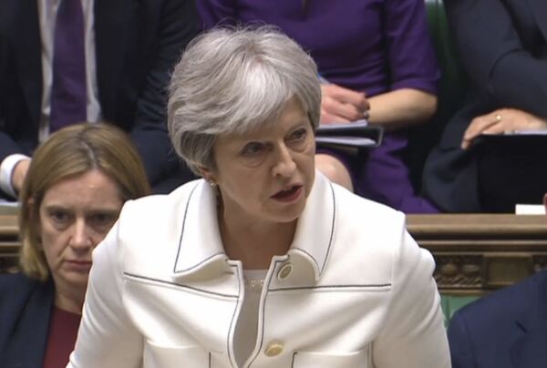 Britain's Prime Minister Theresa May makes a statement to MPs in the House of Commons in London, Monday April 16, 2018 over her decision to launch air strikes against Syria. Britain's Prime Minister Theresa May makes a statement to MPs in the House of Commons in London, Monday April 16, 2018 over her decision to launch air strikes against Syria. - Sputnik International
