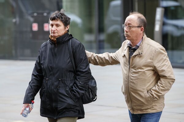 Sophie Lionnet's mother Catherine and her grandfather Stephane Devallone outside the court on Monday April 16 Sophie Lionnet's mother Catherine and her grandfather Stephane Devallone outside the court on Monday April 16 - Sputnik International