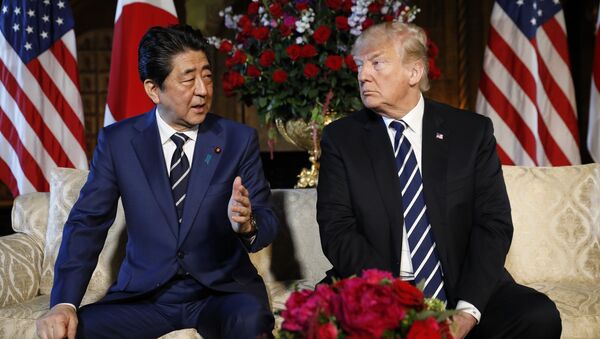 U.S. President Donald Trump listens to Japan’s Prime Minister Shinzo Abe during their bilateral meeting at Trump’s Mar-a-Lago estate in Palm Beach, Florida U.S., April 17, 2018 - Sputnik International