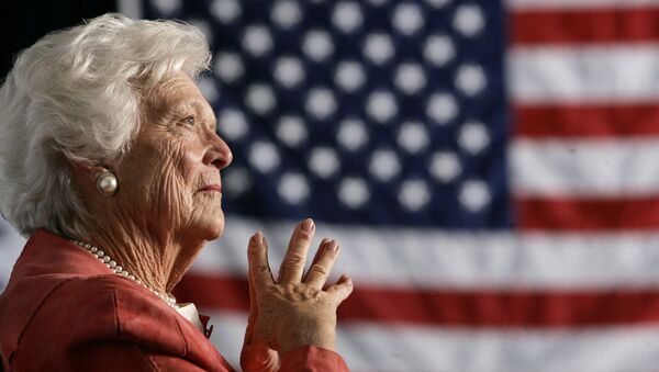 Former U.S. first lady Barbara Bush listens to her son, President George W. Bush, as he speaks at an event on social security reform in Orlando, Florida March 18, 2005 - Sputnik International