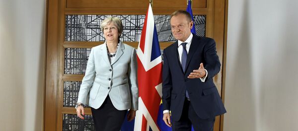 British Prime Minister Theresa May, left, walks with European Council President Donald Tusk prior to a meeting at the Europa building in Brussels on Friday, Dec. 8, 2017 British Prime Minister Theresa May, left, walks with European Council President Donald Tusk prior to a meeting at the Europa building in Brussels on Friday, Dec. 8, 2017 - Sputnik International