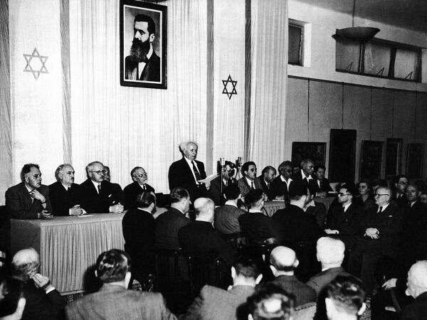 Cabinet Ministers of the new state of Israel are seen on May 14, 1948, at a ceremony at the Tel Aviv Art Museum, marking the creation of the new state Cabinet Ministers of the new state of Israel are seen on May 14, 1948, at a ceremony at the Tel Aviv Art Museum, marking the creation of the new state - Sputnik International