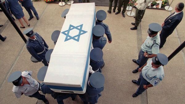 Israeli soldiers carry the flag-draped coffin of Prime Minister Yitzhak Rabin Monday, 6 November 1995 from the Knesset where it laid at state to be brought to its final resting place at Mt. Herzl in Jerusalem - Sputnik International