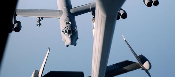 (File) A B-52 Stratofortress from the 28th Air Expeditionary Wing moving in to refuel from a KC-10 Extender, from the 60th Air Expeditionary Group 30 October on its way back to Diego Garcia after a successful bombing mission over Afghanistan - Sputnik International