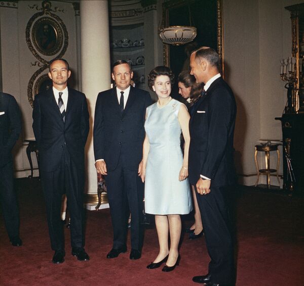 Neil Armstrong, Apollo 11 astronaut shown with Michael Collins and Edwin “Buzz Aldrin as they meet Queen Elizabeth II at Buckingham Palace, Oct. 14, 1969 in London Neil Armstrong, Apollo 11 astronaut shown with Michael Collins and Edwin “Buzz Aldrin as they meet Queen Elizabeth II at Buckingham Palace, Oct. 14, 1969 in London - Sputnik International