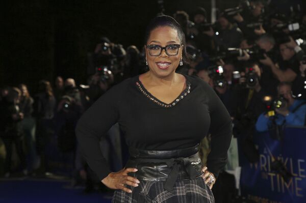 Actress Oprah Winfrey poses for photographers upon arrival at the premiere of the film 'A Wrinkle In Time' in London, Tuesday, March 13, 2018 - Sputnik International