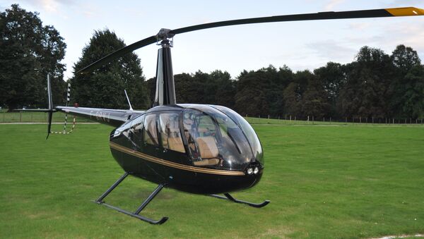 The Robinson R44 helicopter which the gang used to bring in drugs - Sputnik International