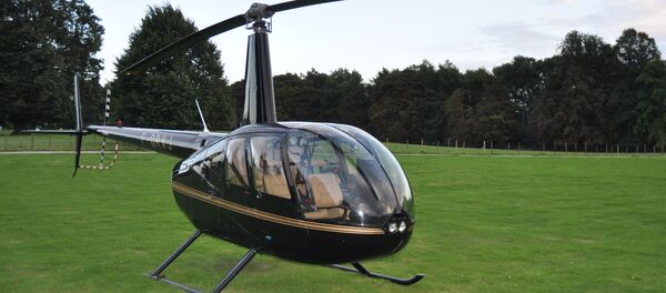The Robinson R44 helicopter which the gang used to bring in drugs The Robinson R44 helicopter which the gang used to bring in drugs - Sputnik International