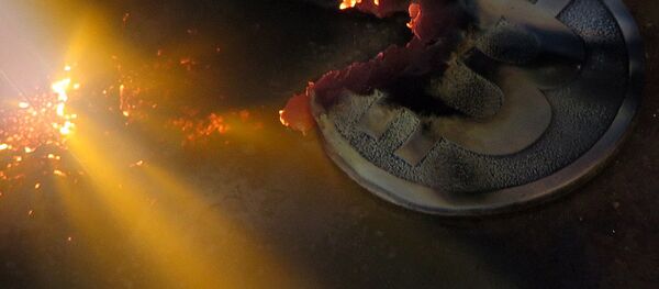 Cutting a Bitcoin Cutting a Bitcoin - Sputnik International