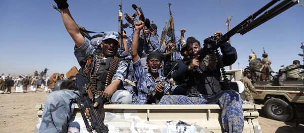 Houthi fighters chant slogans as they ride a military vehicle during a gathering in the capital Sanaa to mobilize more fighters to battlefronts to fight pro-government forces in several Yemeni cities (File) Houthi fighters chant slogans as they ride a military vehicle during a gathering in the capital Sanaa to mobilize more fighters to battlefronts to fight pro-government forces in several Yemeni cities (File) - Sputnik International