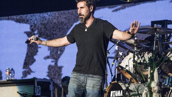 Serj Tankian of System of a Down performs at the 25th Annual KROQ Almost Acoustic Christmas on Dec. 13, 2014, in Inglewood, Calif - Sputnik International