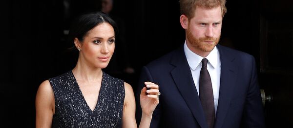 Britain's Prince Harry and his fiancee Meghan Markle leave a service at St Martin-in-The Fields to mark 25 years since Stephen Lawrence was killed in a racially motivated attack, in London, Britain, April 23, 2018 Britain's Prince Harry and his fiancee Meghan Markle leave a service at St Martin-in-The Fields to mark 25 years since Stephen Lawrence was killed in a racially motivated attack, in London, Britain, April 23, 2018 - Sputnik International