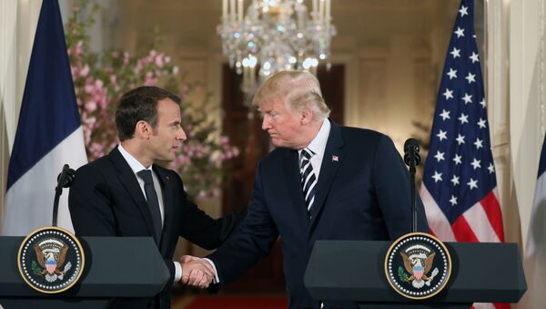 US President Donald Trump and French President Emmanuel Macron shake hands before holding a joint press conference at the White House in Washington, DC, on April 24, 2018 - Sputnik International