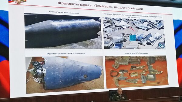 Chief of the Main Operations Directorate of the General Staff of the Russian Armed Forces Sergei Rudskoi at a briefing on the developments in Syria, where he demonstrated fragments of the coalition missiles shot down by the Syrian anti-aircraft defense systems - Sputnik International