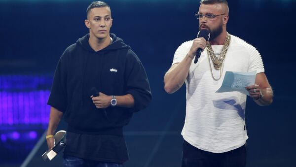 German rappers Kollegah & Farid Bang receive the National Hip-Hop/Urban award during the 2018 Echo Music Award ceremony in Berlin, Germany April 12, 2018 - Sputnik International