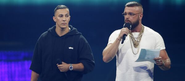 German rappers Kollegah & Farid Bang receive the National Hip-Hop/Urban award during the 2018 Echo Music Award ceremony in Berlin, Germany April 12, 2018 German rappers Kollegah & Farid Bang receive the National Hip-Hop/Urban award during the 2018 Echo Music Award ceremony in Berlin, Germany April 12, 2018 - Sputnik International