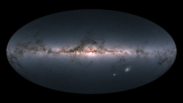 Gaia’s all-sky view of our Milky Way Galaxy and neighbouring galaxies, based on measurements of nearly 1.7 billion stars. The map shows the total brightness and colour of stars observed by the ESA satellite in each portion of the sky between July 2014 and May 2016. - Sputnik International