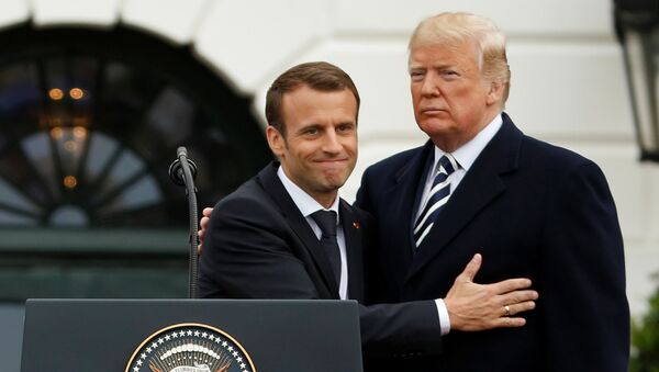 U.S. President Donald Trump and French President Emmanuel Macron attend an arrival ceremony at the White House in Washington, U.S., April 24, 2018 - Sputnik International