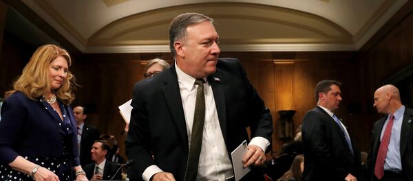CIA Director Mike Pompeo leaves his seat for a break after testifying before a Senate Foreign Relations Committee confirmation hearing on Pompeo's nomination to be secretary of state on Capitol Hill in Washington, U.S. - Sputnik International