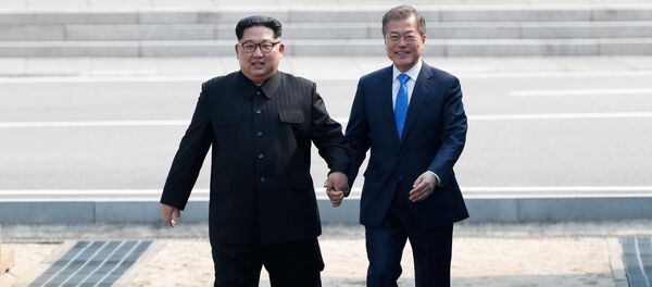 South Korean President Moon Jae-in and North Korean leader Kim Jong Un attend a welcoming ceremony in the truce village of Panmunjom inside the demilitarized zone separating the two Koreas, South Korea, April 27, 2018. South Korean President Moon Jae-in and North Korean leader Kim Jong Un attend a welcoming ceremony in the truce village of Panmunjom inside the demilitarized zone separating the two Koreas, South Korea, April 27, 2018. - Sputnik International