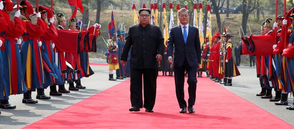 South Korean President Moon Jae-in walks with North Korean leader Kim Jong Un at the truce village of Panmunjom inside the demilitarized zone separating the two Koreas, South Korea, April 27, 2018 South Korean President Moon Jae-in walks with North Korean leader Kim Jong Un at the truce village of Panmunjom inside the demilitarized zone separating the two Koreas, South Korea, April 27, 2018 - Sputnik International