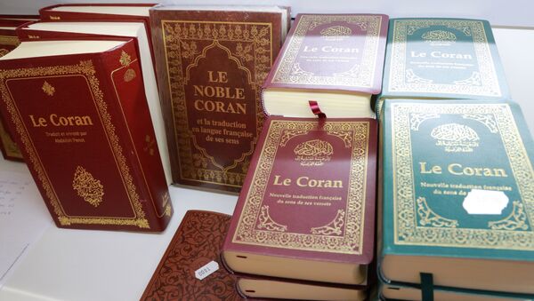 This photo taken on March 30, 2018 shows a copy of the Koran during the 35th annual meeting of the French Muslim community at Le Bourget, north of Paris - Sputnik International