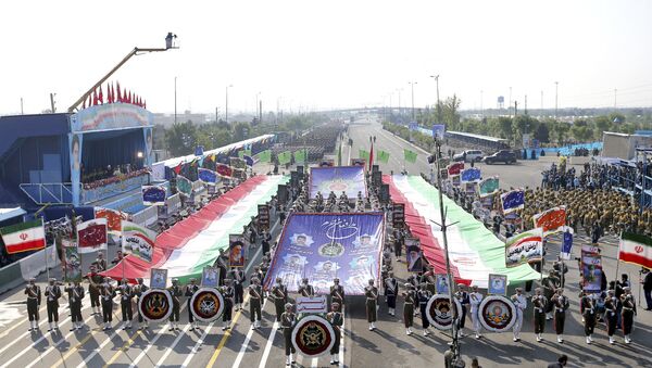 Iranian army troops march during a parade marking National Army Day in front of the mausoleum of the late revolutionary founder Ayatollah Khomeini, just outside Tehran, Iran, Wednesday, April 18, 2018 - Sputnik International