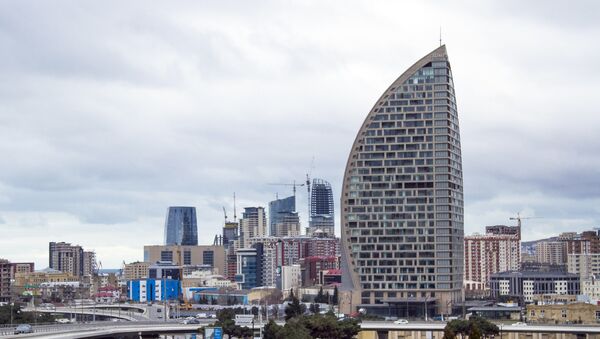 In this Feb. 19, 2016, file photo, The Trump International Hotel, the highest building, is seen in Baku, Azerbaijan - Sputnik International