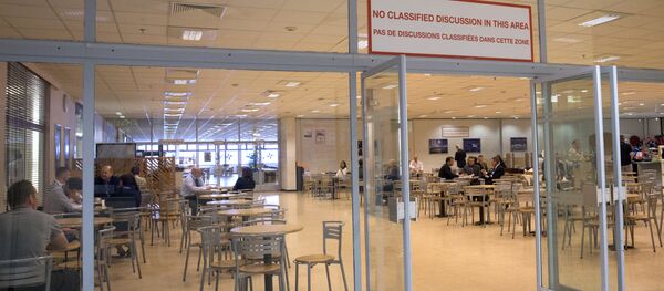 People dine in the cafeteria section at the old NATO headquarters in Brussels on Thursday, April 19, 2018 - Sputnik International