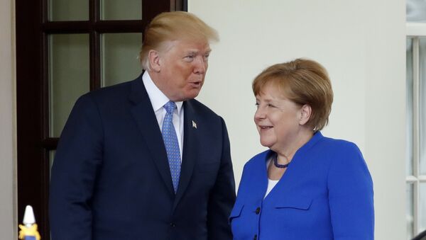 President Donald Trump greets German Chancellor Angela Merkel, Friday April 27, 2018, at the White House in Washington - Sputnik International