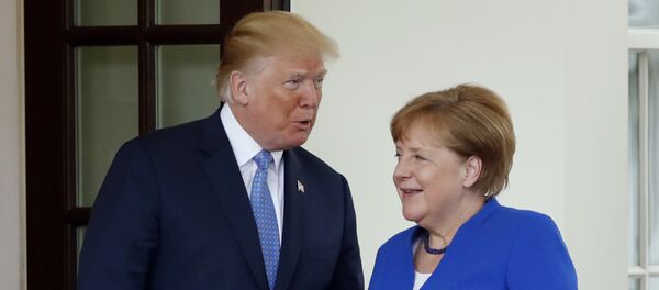 President Donald Trump greets German Chancellor Angela Merkel, Friday April 27, 2018, at the White House in Washington - Sputnik International
