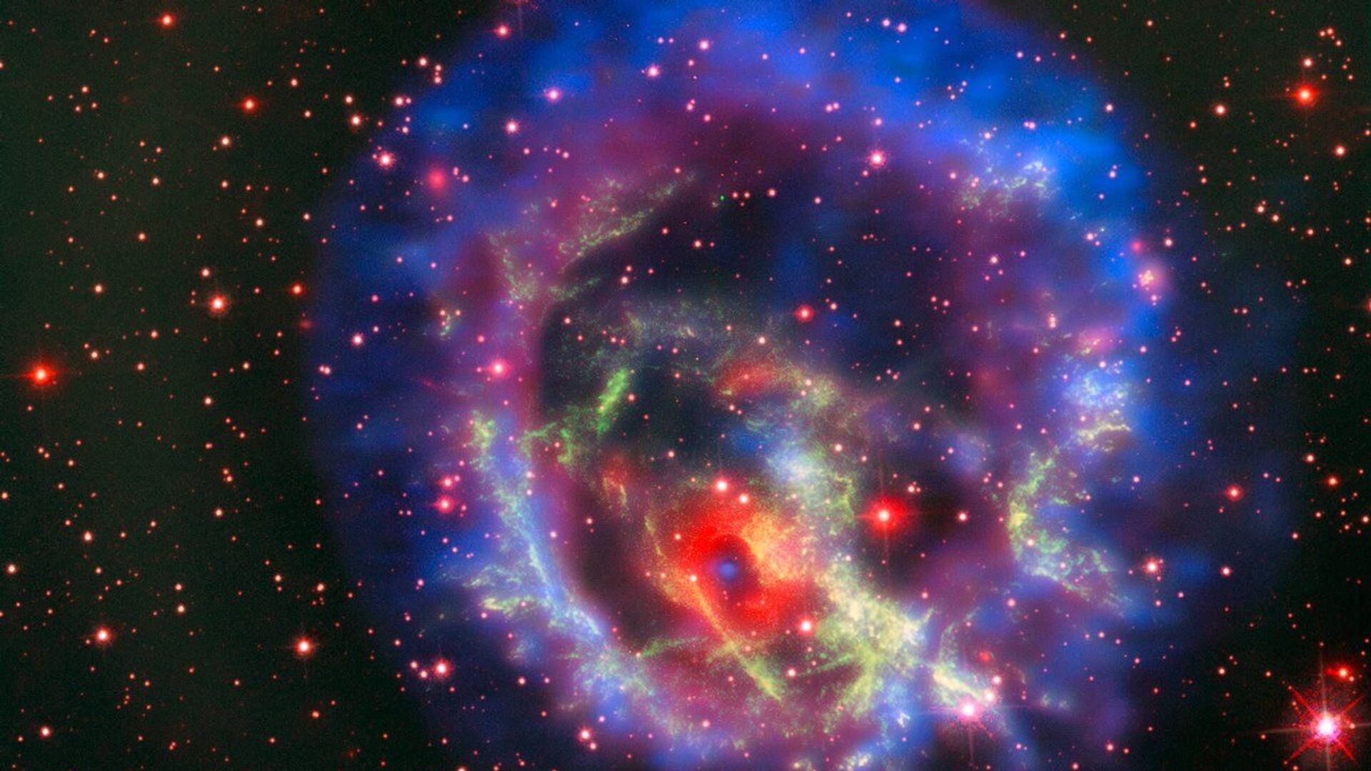 Остатки сверхновой 1E 0102.2-7219, расположенной в ближайшей к нам галактике Малое Магелланово Облако - Sputnik International, 1920, 07.09.2021