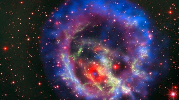 Остатки сверхновой 1E 0102.2-7219, расположенной в ближайшей к нам галактике Малое Магелланово Облако - Sputnik International