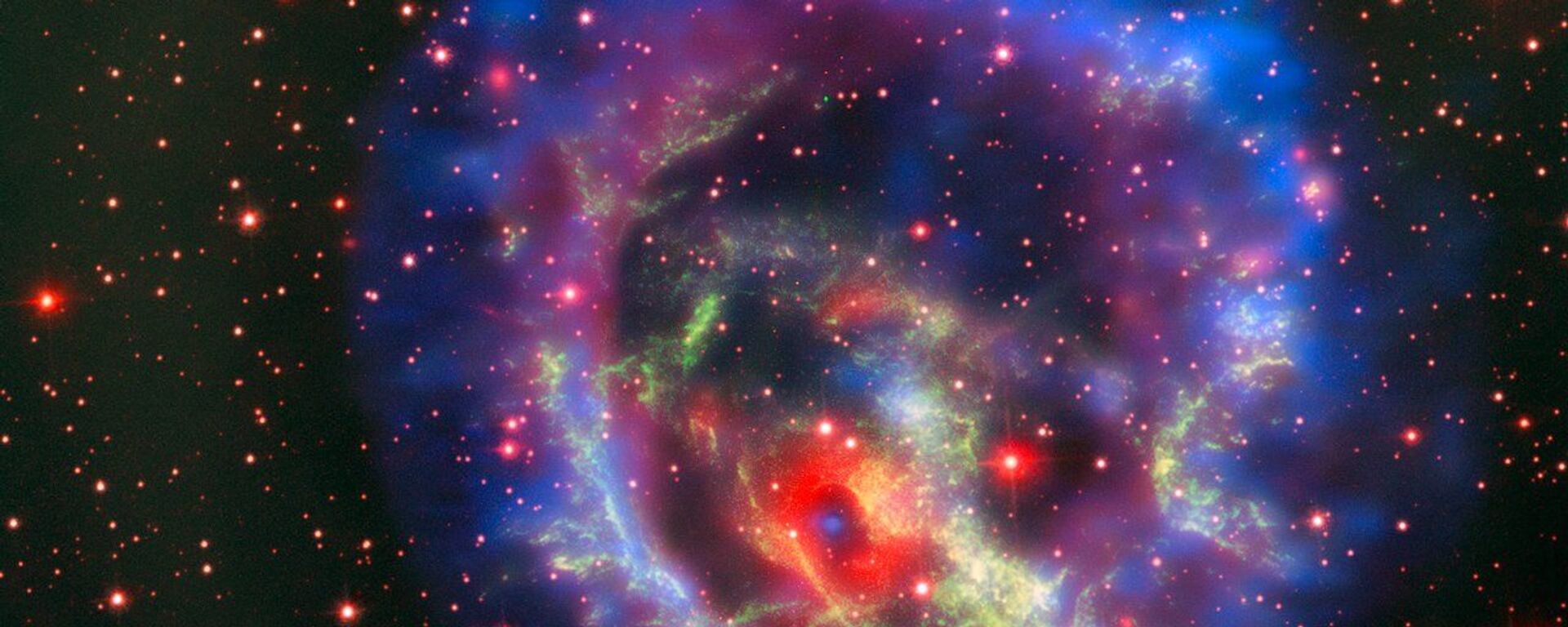 Остатки сверхновой 1E 0102.2-7219, расположенной в ближайшей к нам галактике Малое Магелланово Облако - Sputnik International, 1920, 26.10.2023