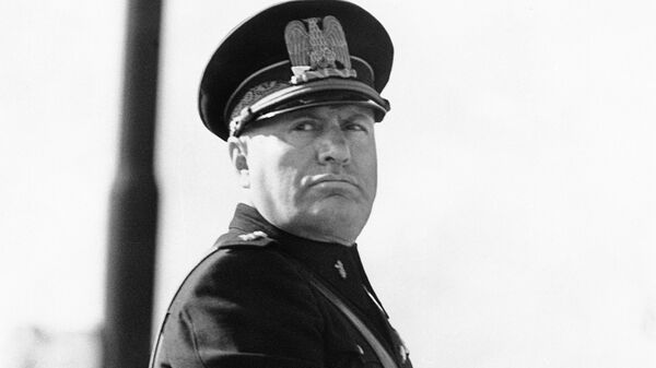 Benito Mussolini, in the newly introduced Fascist uniform, on his horse at a parade of police to commemorate the 13th anniversary of the foundation of the Metropolitan Police in Rome, Italy around Oct. 20, 1938 - Sputnik International