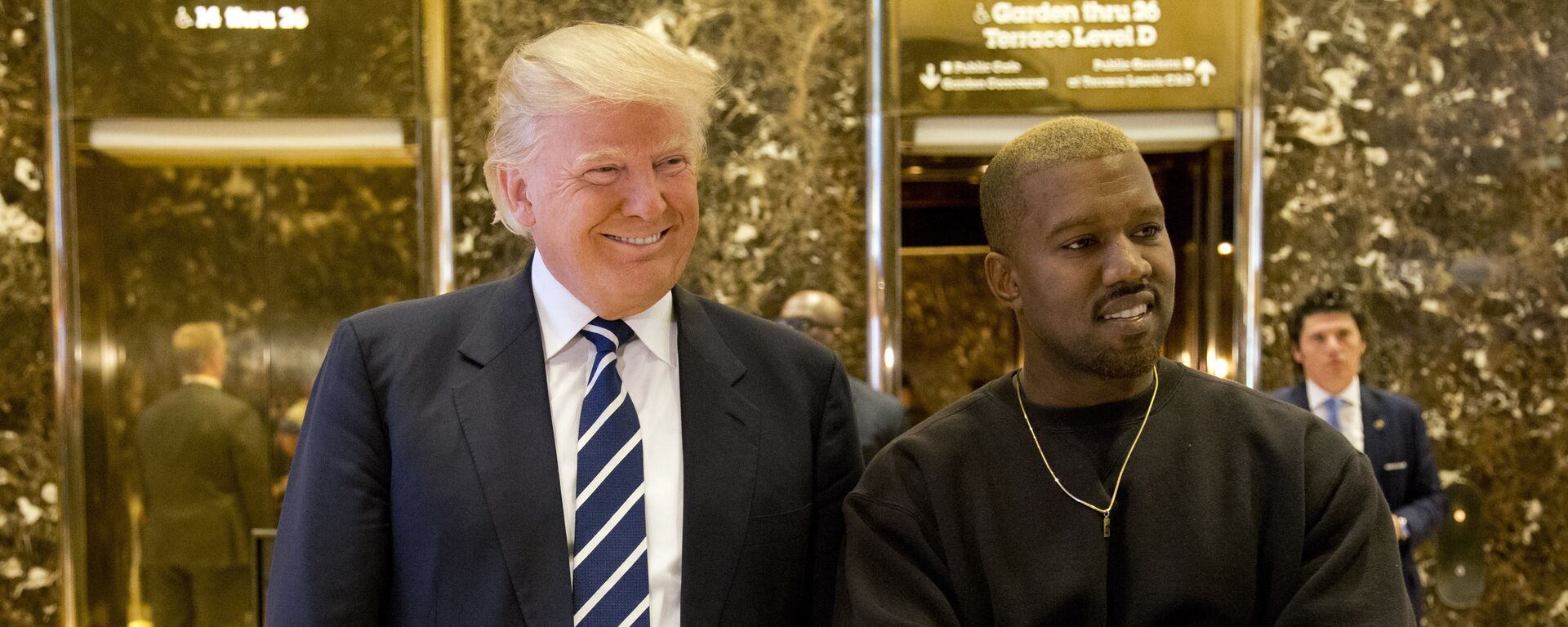 President-elect Donald Trump, left, and Kanye West pose for a picture in the lobby of Trump Tower in New York, Tuesday, Dec. 13, 2016 - Sputnik International, 1920, 18.10.2022
