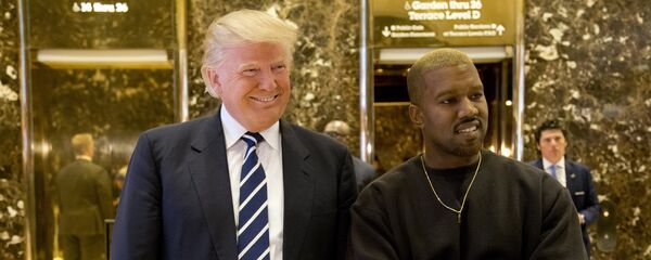 President-elect Donald Trump, left, and Kanye West pose for a picture in the lobby of Trump Tower in New York, Tuesday, Dec. 13, 2016 - Sputnik International