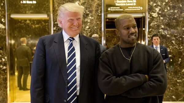 President-elect Donald Trump, left, and Kanye West pose for a picture in the lobby of Trump Tower in New York, Tuesday, Dec. 13, 2016 - Sputnik International