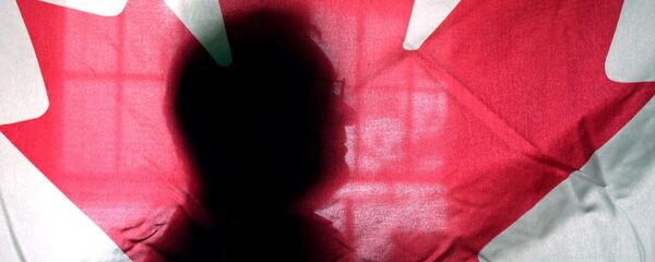 Silhouette behind a Canadian flag Silhouette behind a Canadian flag - Sputnik International