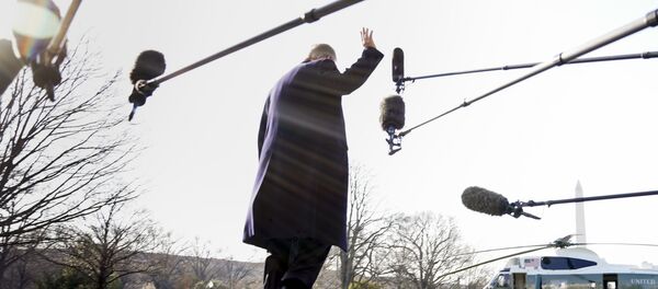 President Donald Trump waves before boarding Marine One on the South Lawn of the White House in Washington, Tuesday, March 13, 2018 - Sputnik International